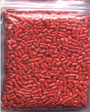recycled red coloured polypropylene granules.